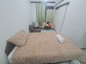 Room with a bed and furniture