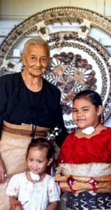 Elderly lady and kids posing